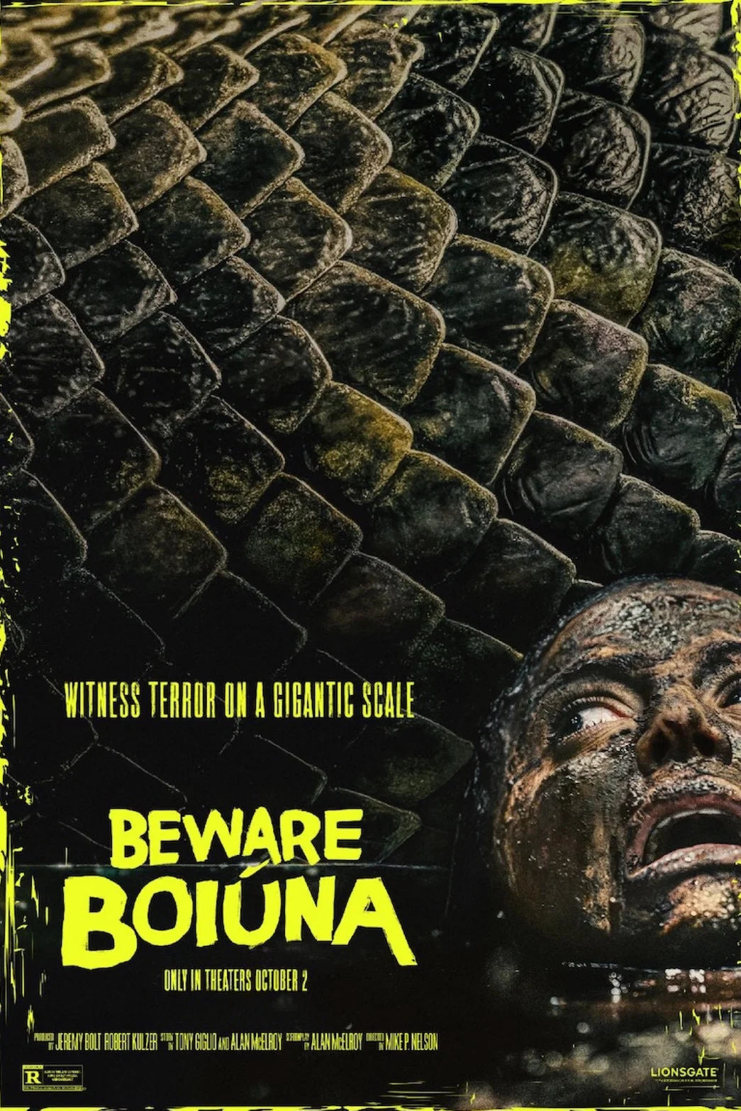 Beware Boiúna poster with giant dark scales, a frightened mud-covered face and acid-yellow title lettering.