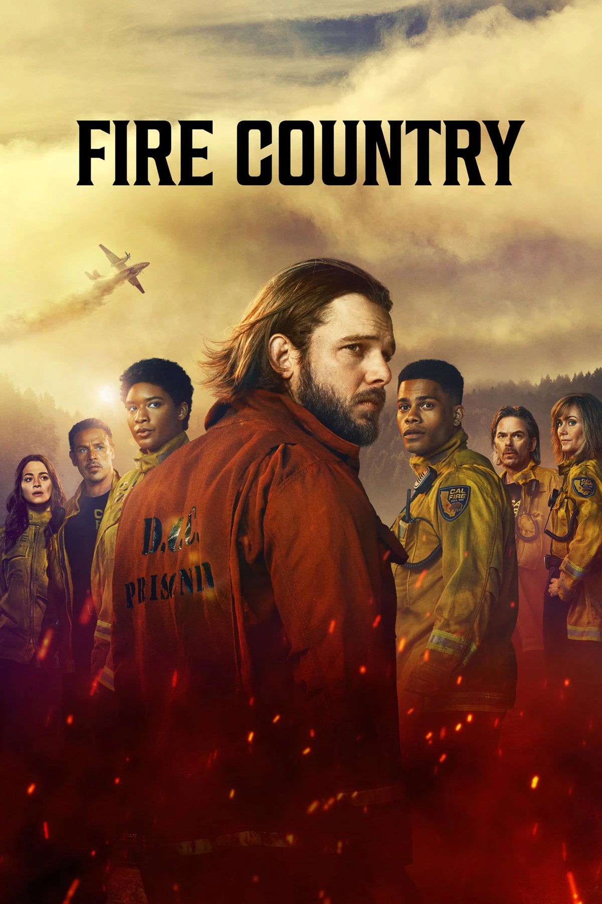Fire Country poster with Max Thieriot and the firefighting crew against smoke and glowing embers
