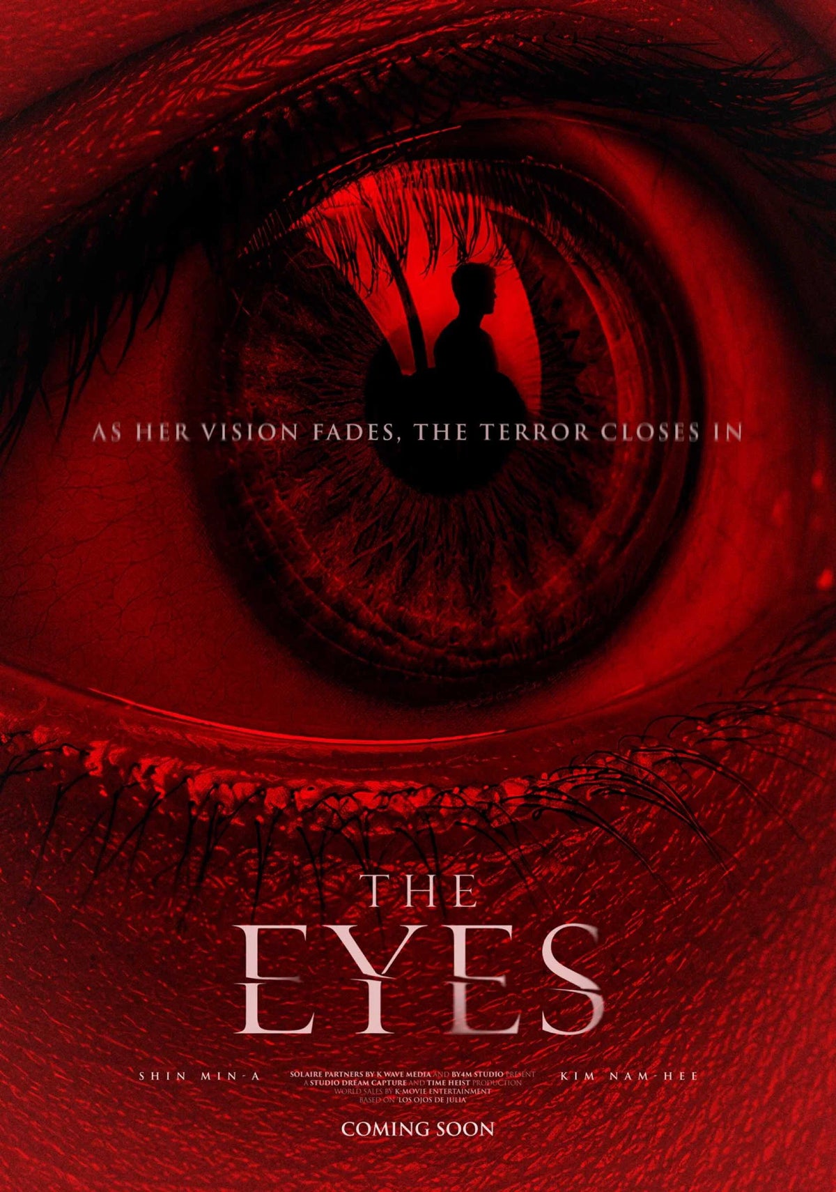 The Eyes (2026) poster featuring a red eye with a dark silhouette reflected inside